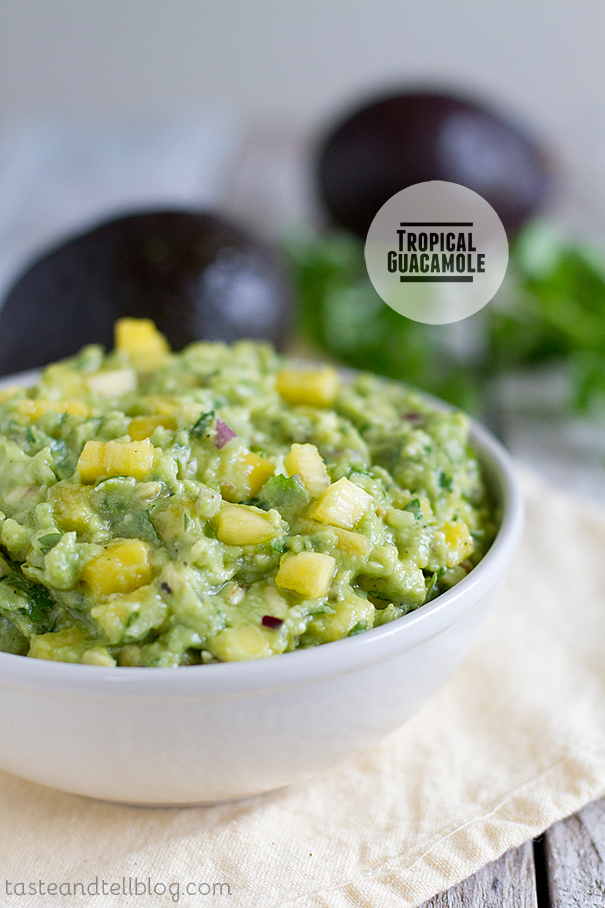 Tropical Guac|<image-caption></p>
<p>Tropical guac loaded with pineapple and mango
<p></image-caption>|Taste and Tell” title=”Tropical Guac|<image-caption>
<p>Tropical guac loaded with pineapple and mango
<p></image-caption>|Taste and Tell” /></div>
<p><!-- END scald=3216 --></div>
</div>
<p>TROPICAL GUACAMOLE

<p>With lime and cilantro being the primary ingredients of traditional guacamole, it makes sense that other tropical flavors are a natural fit. Deborah Harroun over at Taste and Tell knows how to kick up her guac with the tastes of the tropics.</p>

<p>“This version of guacamole is a great way to transport yourself to a tropical island, with the pineapple and mango starring right alongside the avocados,” she says. “It’s definitely a delicious way to jazz up your guacamole!”</p>

<p>This tangy dip pairs especially well with margaritas.

<p>For the full recipe, click here. 
</div>
</div>
<p></text>
</div><div class=
