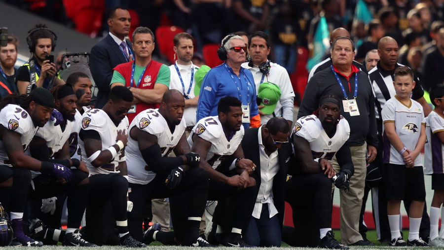 Ray Lewis take a knee Baltimore Ravens protest lock arms