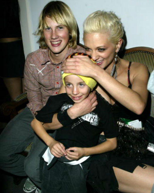 Jimmy Bennett with actors John Robinson and Asia Argento