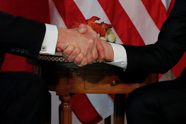 President Trump Macron Handshake