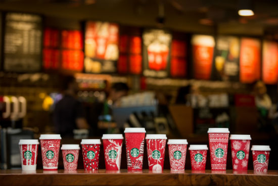 red Starbucks holiday cups