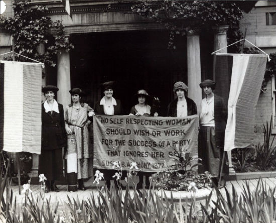 Women put voting stickers on Susan B. Anthony's grave for midterm elections