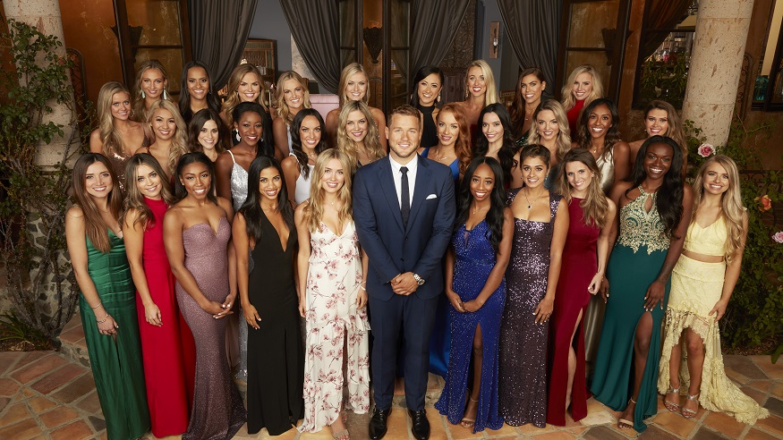 Colton Underwood poses with the cast of The Bachelor season 23
